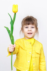 child with tulips