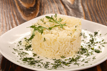 Steamed rice served green herbs