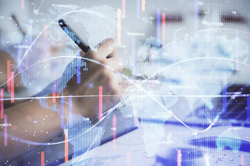 Double exposure of business theme drawing over people taking notes background. Concept of financial world