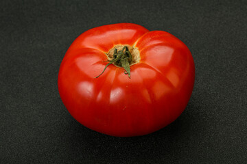 Ripe big juicy red tomato