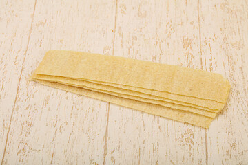 Natural salted potato chips heap