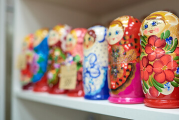 Fototapeta na wymiar Row of multi-colored nesting dolls