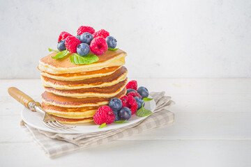 Pancakes stack with fresh berries
