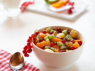 .Diet, healthy fruit salad in a white bowl-healthy Breakfast, weight loss concept.