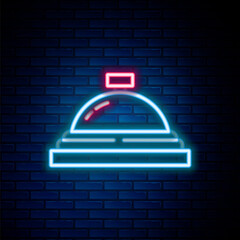 Glowing neon line Hotel service bell icon isolated on brick wall background. Reception bell. Colorful outline concept. Vector