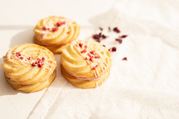 selection of sweet baked cream edible flowers and fruit dessert cakes for mothersday, wedding, birthday, paerty celebration. viola odorata cake. 