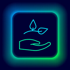 Glowing neon line Leaf in hand of environmental protection icon isolated on black background. Seed and seedling. Planting sapling. Ecology concept. Colorful outline concept. Vector