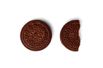 Chocolate cookie with milk filling isolated on white background. Top view.