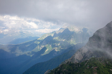 Fototapeta premium Caucasus mountains in the clouds.