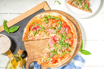 Pizza with ham and mushrooms