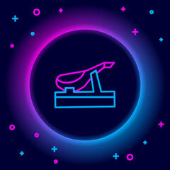 Glowing neon line Spanish jamon on the wooden jamonera icon isolated on black background. Colorful outline concept. Vector