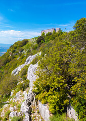 Fototapeta na wymiar Monte Soratte in Sant'Oreste (Italy) - The beautiful landscapes with old hermitages in the mountain natural reserve in province of Rome, Sabina area, during the spring.