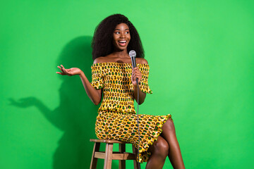Photo of attractive black woman happy positive smile speak talk microphone performance isolated...