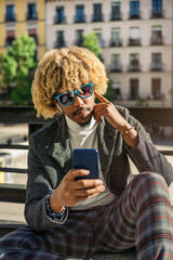 Fototapeta premium African Man Using Mobile Phone