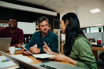 Business woman correcting colleague while brainstorming ideas for new project 