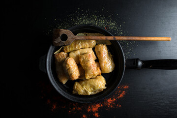 Cabbage rolls with meat, rice and vegetables. Stuffed cabbage leaves with meat. Known as sarma, golubtsy, dolma.