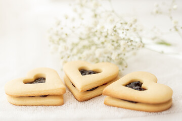 selection of sweet baked cream edible flowers and fruit dessert cakes for mothersday, wedding, birthday, paerty celebration. viola odorata cake. 