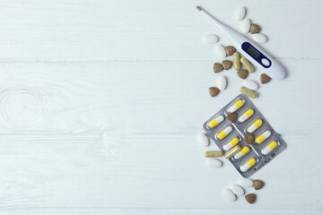 Fototapeta premium Concept of alternative cold treatment on white wooden table, space for text