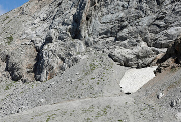 Little snow left of the rocks due to the melting of the glacier due to climate change