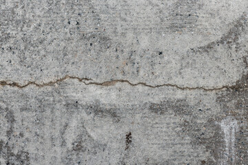 Dirty cracked concrete wall