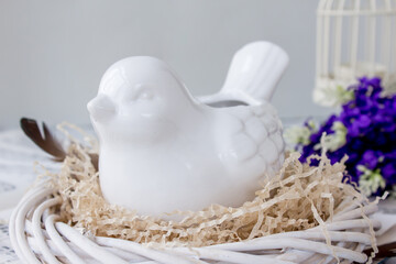 Easter decoration with bird and lilac, inspiration concept