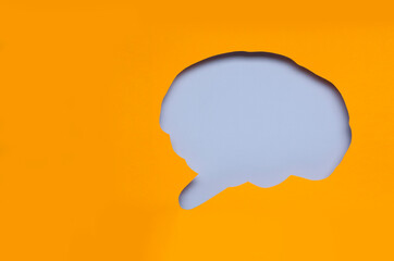 Top view of empty shape of human brain made of brught orange and blue paper