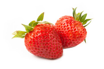 Two strawberries with strawberry leaf on white background.