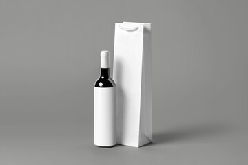 Blank tall white wine bottle bag mockup set, isolated, 3d rendering. Empty carry handbag for wine or vodka mock up. Clear paper packaging fit for store branding. - obrazy, fototapety, plakaty