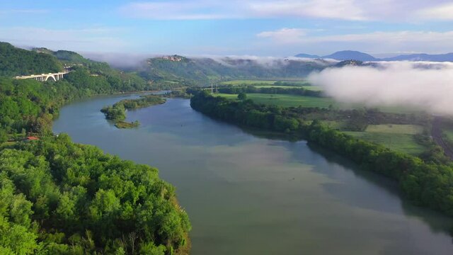 Tevere Farfa Nature Reserve, Nazzano, Lazio, Italy.
The river valley of the Tiber north of Rome. Aerial view with drone in 4K
