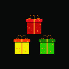 bundle set of gift box in red, yellow and green on a dark background