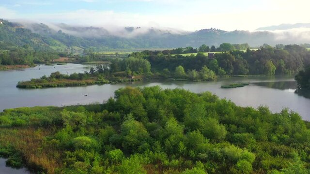 Tevere Farfa Nature Reserve, Nazzano, Lazio, Italy.
The river valley of the Tiber north of Rome. Aerial view with drone in 4K