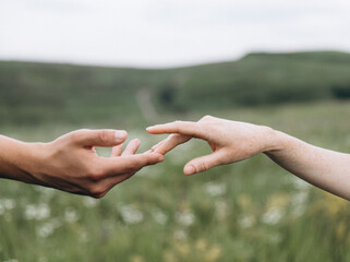 couple holding hands together