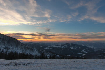 Sunset in the mountains. Winter in the mountains at sunset. Silesian Beskids.