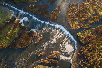 Venta waterfall in the fog, Kuldiga, Latvia. Captured from above.