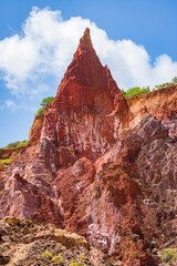 Colored sand cliffs with a highlight to Peak Princess Castle, in the municipality of Conde, on the south coast of Joao Pessoa, Paraiba, Brazil on September 29, 2012.