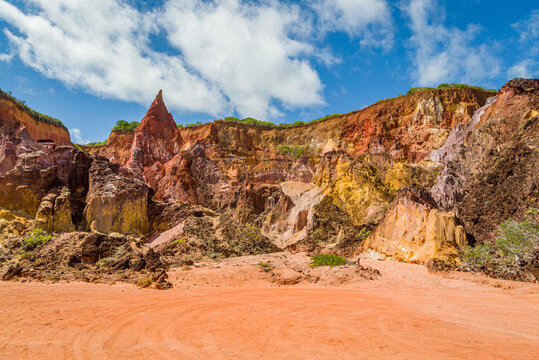 Colored sand cliffs with a highlight to Peak Princess Castle, in the municipality of Conde, on the south coast of Joao Pessoa, Paraiba, Brazil on September 29, 2012.