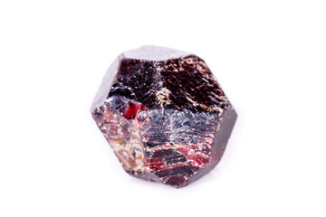 Macro of a mineral garnet stone on a white background