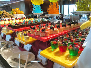 Dessert, cake and patisserie self-service buffet during Sunday Brunch breakfast in main dining room...