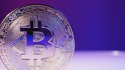 Close up bitcoin and digital stock market graph bar on black. Cryptocurrency. Bitcoin Stock Growth. Investing in virtual assets. Investment platform with charts and bitcoin coin. digital money. 