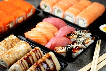 Sushi set with salmon, soft cheese, tuna, smoked eel. Healthy food. 