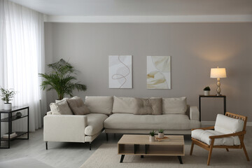 Naklejka na ściany i meble Big comfortable sofa in living room. Interior design