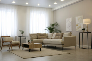 Big comfortable sofa in living room. Interior design