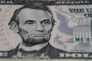 fragment of 5 dollar bill