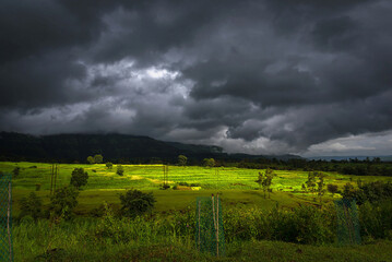 dark clouds over the field in monsoon season
