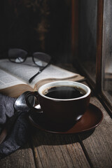 Hot Cup of Coffee and Book