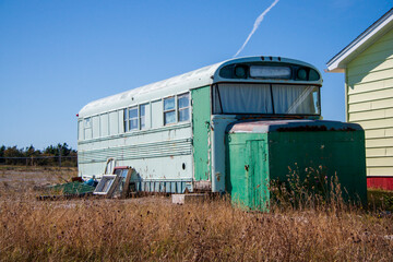 Old school bus converted into camper cabin.