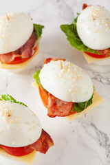 blt egg sandwich with cheese bacon lettuce. healthy keto low carb diet