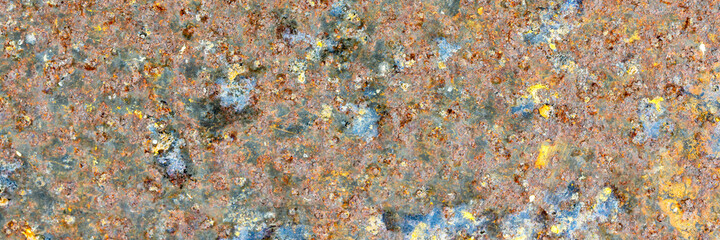 Texture of rusty metal. Rough metal surface with rust. Corroded and oxidized old iron. Rusted and aged metal sheet. Wide panoramic texture for background and design in grunge style.