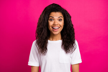 Portrait of attractive amazed cheerful girl good news reaction isolated over vivid pink fuchsia...