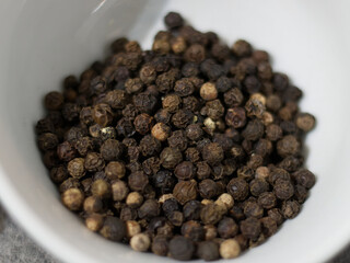 black pepper in a white bowl